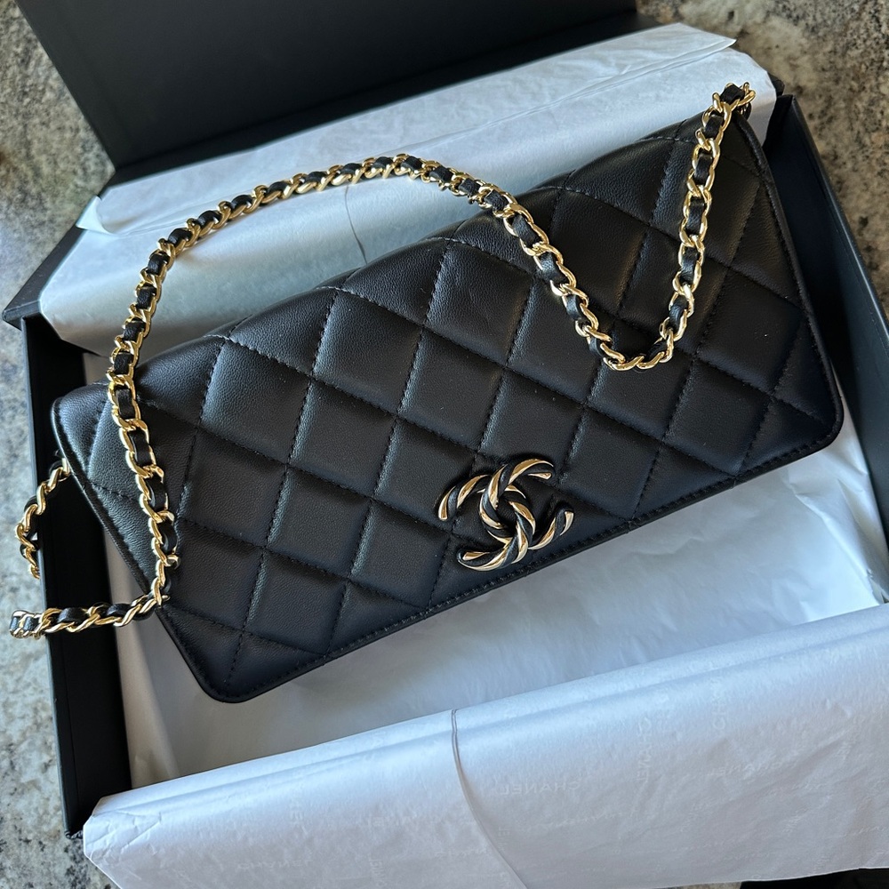 Chanel black quilted shoulder purse. Authentic with receipt, worn only once.